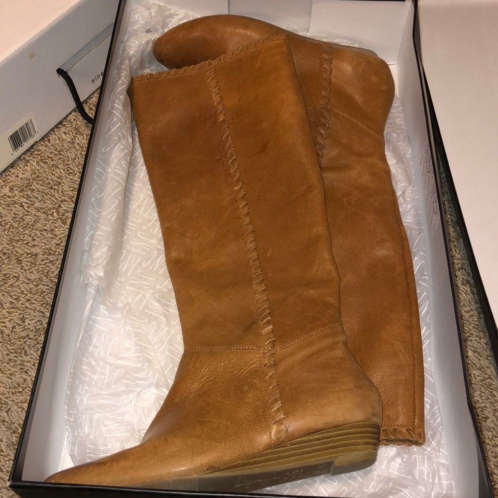 Knee high wedge boots